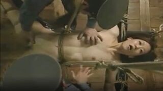Slave girl bdsm helplessly bound as cruel master commands her to surrender